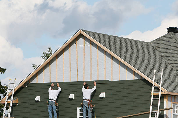 Professional Siding Replacement technician working in Stow, OH